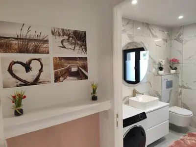 Salle de bains dans l'établissement Appartement meublé Rixheim Alsace