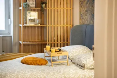 Un ou plusieurs lits dans un hébergement de l'établissement Zenora Loft Hot Tub & Arcade in Downtown
