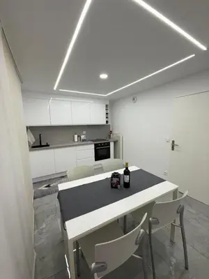 Cuisine ou kitchenette dans l'établissement Appartement Lumière