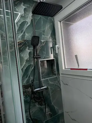 Salle de bains dans l'établissement Appartement Lumière
