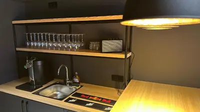 Cuisine ou kitchenette dans l'établissement Les 4 Fontaines