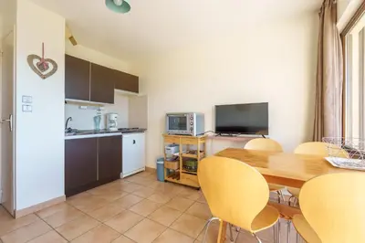 Cuisine ou kitchenette dans l'établissement Le Cocon du Chaud Costet - Avec balcon