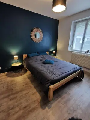 Un ou plusieurs lits dans un hébergement de l'établissement Appartement nid douillet 3 étoiles au centre ville de la Bresse