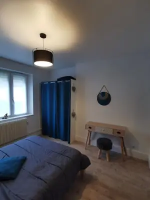 Un ou plusieurs lits dans un hébergement de l'établissement Appartement nid douillet 3 étoiles au centre ville de la Bresse