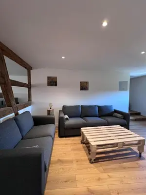 Coin salon dans l'établissement Spacious village house