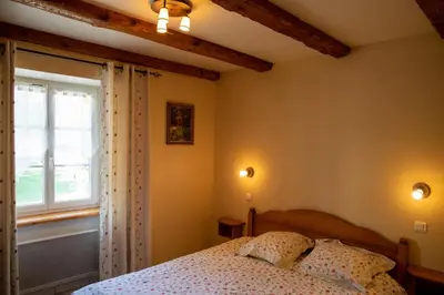 Un ou plusieurs lits dans un hébergement de l'établissement La Ferme du Franz