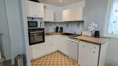 Cuisine ou kitchenette dans l'établissement Le Refuge - Petite maison de village