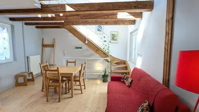 Coin salon dans l'établissement Le Refuge - Petite maison de village