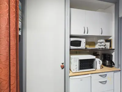Cuisine ou kitchenette dans l'établissement Studio des Quiches Lorraines