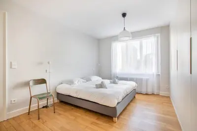 Un ou plusieurs lits dans un hébergement de l'établissement Le Majestic - Spacieux - Moderne - Proche centre - Terrasse