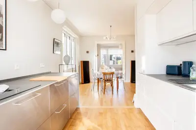 Cuisine ou kitchenette dans l'établissement Le Majestic - Spacieux - Moderne - Proche centre - Terrasse