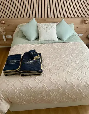 Un ou plusieurs lits dans un hébergement de l'établissement Magnifique appartement de 91m2 au centre de Colmar