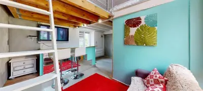 Un ou plusieurs lits dans un hébergement de l'établissement Charmant duplex aux portes de Belfort