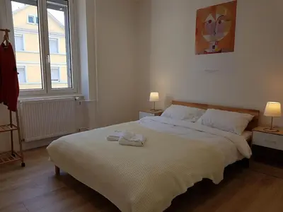 Un ou plusieurs lits dans un hébergement de l'établissement Maison Vauban