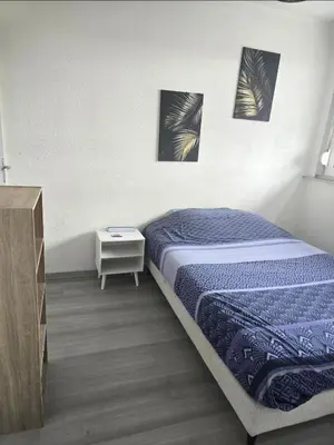 Un ou plusieurs lits dans un hébergement de l'établissement Le Stud