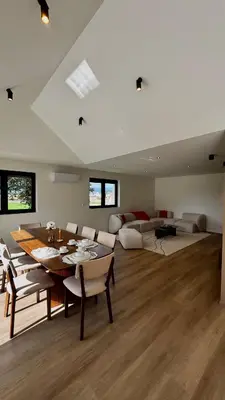 Coin salon dans l'établissement Appartement neuf - 10 minutes de Colmar - Parking gratuit