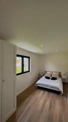 Un ou plusieurs lits dans un hébergement de l'établissement Appartement neuf - 10 minutes de Colmar - Parking gratuit