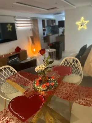 Coin salon dans l'établissement appartement en sous sol