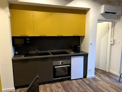 Cuisine ou kitchenette dans l'établissement Appartement 9 lumineux, agréable