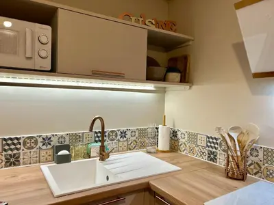 Cuisine ou kitchenette dans l'établissement le Roy de coeur