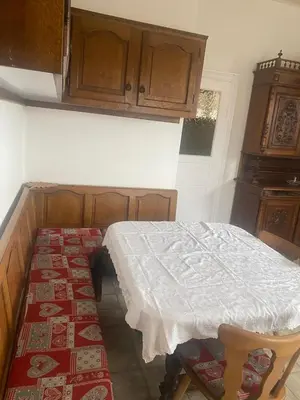 Un ou plusieurs lits dans un hébergement de l'établissement Maison Chez Grand-mère, Route des vins