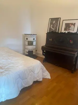 Un ou plusieurs lits dans un hébergement de l'établissement Maison Chez Grand-mère, Route des vins