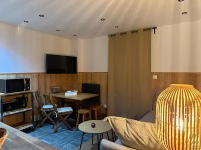 Télévision ou salle de divertissement dans l'établissement Appartement cosy en plein centre de Gérardmer