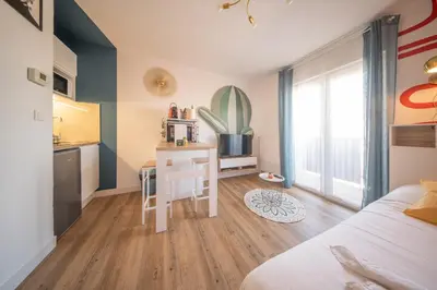 Un ou plusieurs lits dans un hébergement de l'établissement Elegance Pfastatt 2 Studio Centre Illzach