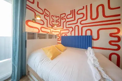 Un ou plusieurs lits dans un hébergement de l'établissement Elegance Pfastatt 2 Studio Centre Illzach