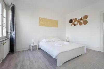 Un ou plusieurs lits dans un hébergement de l'établissement Magnifique Appartement Mulhouse Stationnement Gratuit