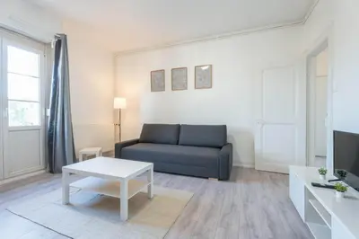 Coin salon dans l'établissement Magnifique Appartement Mulhouse Stationnement Gratuit