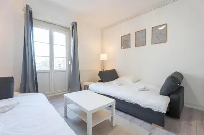 Un ou plusieurs lits dans un hébergement de l'établissement Magnifique Appartement Mulhouse Stationnement Gratuit