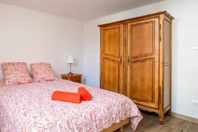 Un ou plusieurs lits dans un hébergement de l'établissement Gîte Chez Madeleine en plein coeur de Rouffach