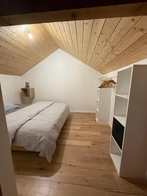 Un ou plusieurs lits dans un hébergement de l'établissement Le Chalet des Vosges