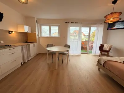 Cuisine ou kitchenette dans l'établissement Le clos des roses