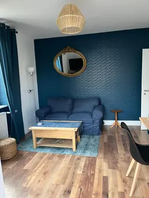 Coin salon dans l'établissement Chez F & G terrasse privée dans jardin