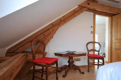 Un ou plusieurs lits dans un hébergement de l'établissement Les Balcons De Riquewihr