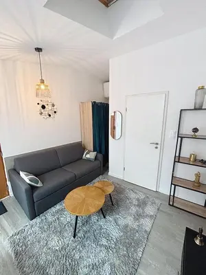 Coin salon dans l'établissement Le Jardin Secret Apartment