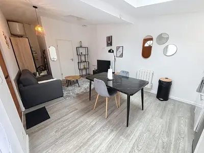 Coin salon dans l'établissement Le Jardin Secret Apartment