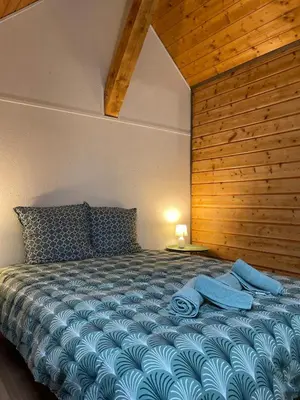 Un ou plusieurs lits dans un hébergement de l'établissement Les nuits du Lion