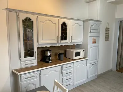 Cuisine ou kitchenette dans l'établissement Charmant appartement F1