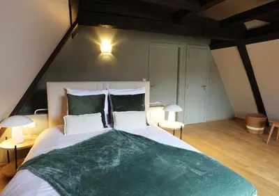 Un ou plusieurs lits dans un hébergement de l'établissement Pistache - Charme et confort au cœur de Colmar