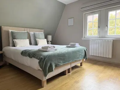 Un ou plusieurs lits dans un hébergement de l'établissement Pistache - Charme et confort au cœur de Colmar