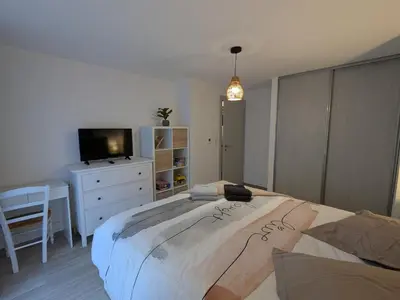 Un ou plusieurs lits dans un hébergement de l'établissement Appartement cocooning au cœur des Hautes-Vosges avec terrasse et parking privé - FR-1-589-841