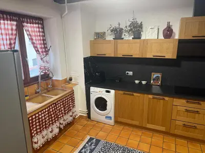 Cuisine ou kitchenette dans l'établissement Le petit nid de cigogne
