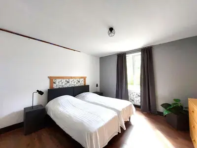 Un ou plusieurs lits dans un hébergement de l'établissement MERG holiday home