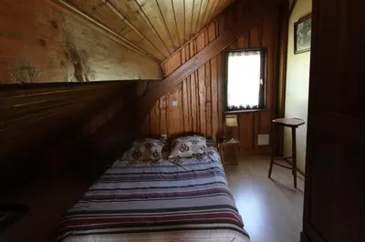 Un ou plusieurs lits dans un hébergement de l'établissement Gîte chaleureux la 2 CV Verte Calme et nature