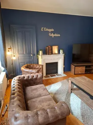 Coin salon dans l'établissement L'echappée Belfortaine - Appartement Belfort, 1 chambre Sauna proche Technhom