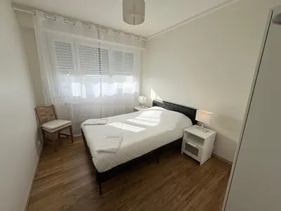 Un ou plusieurs lits dans un hébergement de l'établissement Le Pasteur Élégant T2 au centre de Mulhouse