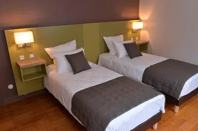 Un ou plusieurs lits dans un hébergement de l'établissement Gîte du Soleil - close to Europa-Park